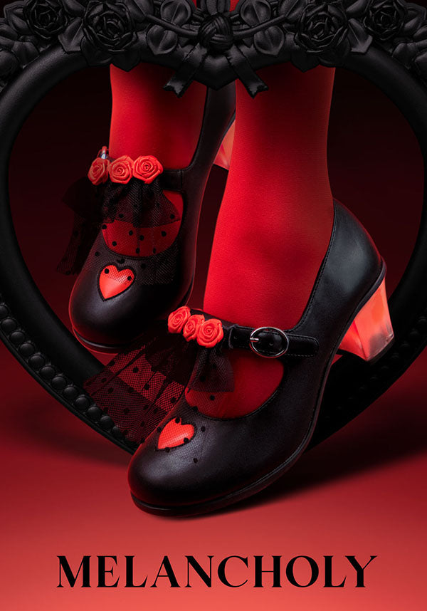 Melancholy | MID HEELS