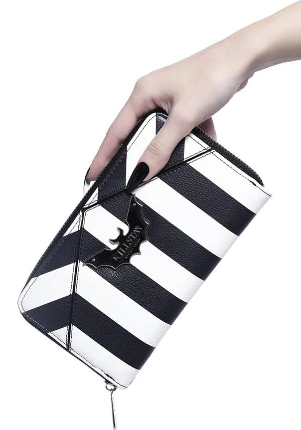 Never Trust The Living | WALLET