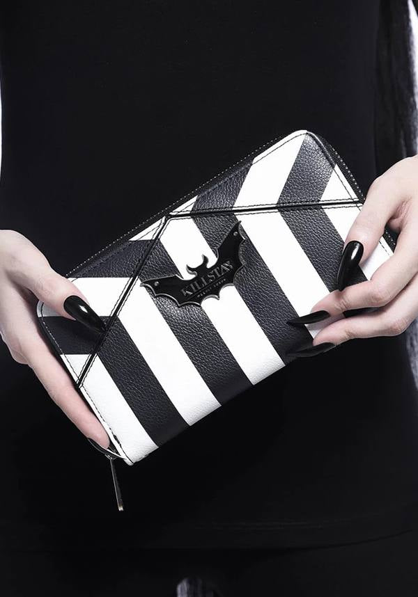 Never Trust The Living | WALLET