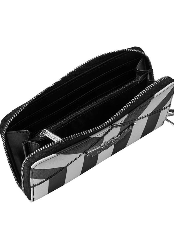 Never Trust The Living | WALLET