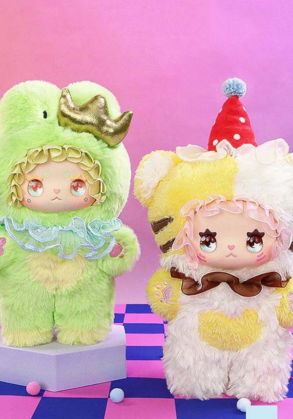 Two colorful plush toys on a pink and purple striped background