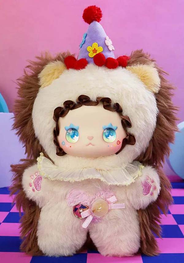 Plush toy with lion-like design and white outfit on a colorful background