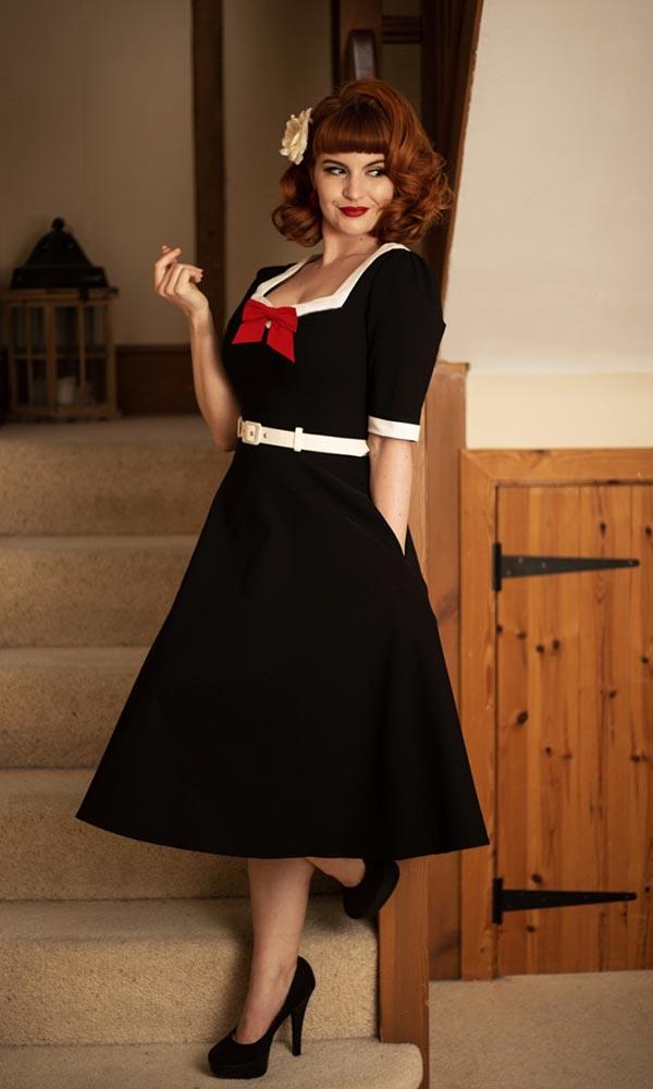 Sadie | 50s SWING DRESS - Beserk - 50s, 50s inspired, all, all clothing, all ladies clothing, belt, black, black and white, bow, clickfrenzy15-2023, clothing, CO197137, collectif, discountapp, dress, dressapril25, dresses, feb23, fp, googleshopping, goth, goth summer clothing, gothic, knee length dress, ladies clothing, ladies dress, ladies dresses, plus size, R050223, red, repriced240523, retro, short sleeved dress, summer clothing, vintage, waist belt, women, womens, womens dress, womens dresses